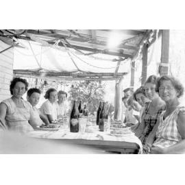 The McKergow and Humphries families celebrating Christmas at Balgal Beach, ca 1950 