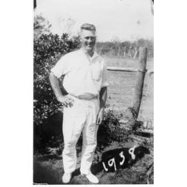 Ernie Kelso preparing for tennis at Greenbower, ca 1938 