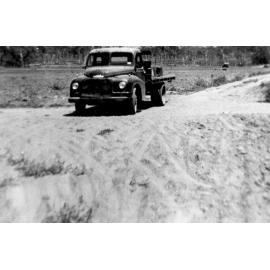 Ernie Kelso's Austin truck on potato farm, 1950 