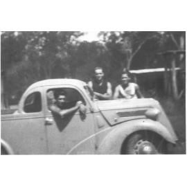 Utility truck with driver and friends, n.d. 