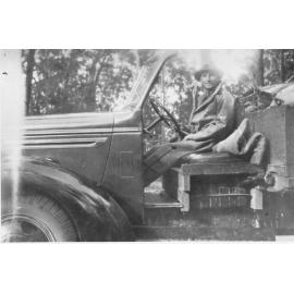 Henry Hussey in a loaded up truck, 1939 