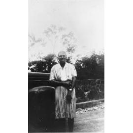 Crystal Creek, woman with truck on Crystal Creek Bridge, n.d. 