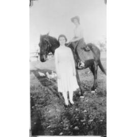 Nellie Ryan, with Mollie Hogan mounted on the "thoroughbred", ca 1920 
