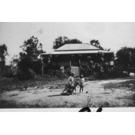 Pat Neville and Maureen Neville with dog, Manton, 1934