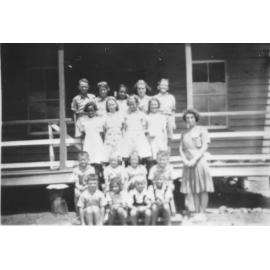 Manton School photograph with teacher Nellie Stoddart, Manton, Townsville, 1945 