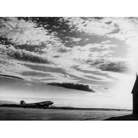 DC 3 Aircraft on airstrip, Garbutt Airport, 1953 