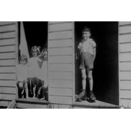 Nola McKergow with Olive and Shirley Harrington, and Ron Hamilton at timber camp, Puzzle Creek, ca 1943 