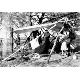 McKergow family and friends packing up camp, Rollingstone Creek, ca 1946