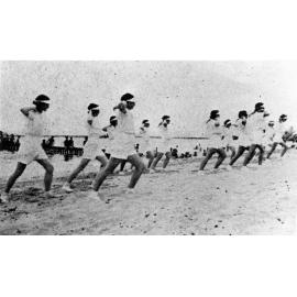 The Pastimes Club doing physical culture at Picnic Bay, Magnetic Island, ca.1938. 