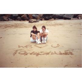 "We love you Townsville", written in the sand on the Strand beach, 1991