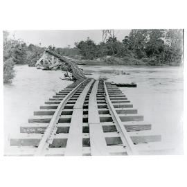 Flood damage to the Inkerman Bridge looking across the Burdekin River from the Ayr side