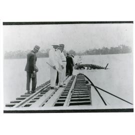 Railway officials inspecting flood damage to the Inkerman Bridge, 1917