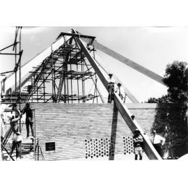 Putting roof beams into place, St. Peter's Church, West End, Townsville, 1964. 