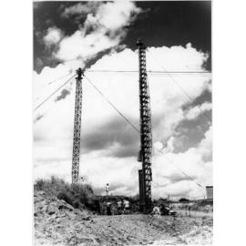 The first pile being driven for the Charles Barton bridge, across Ross River at Nathan Street, Townsville 