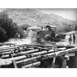 Tearing out the timber of the old causeway, Charters Towers Road, Townsville 