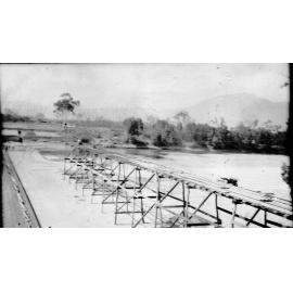 Extending the tramway across Ross River during the construction of Aplin's weir, Townsville, October 1943