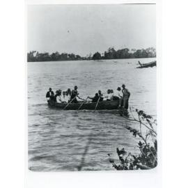 Men in a boat on the flooded Burdekin River, Ayr, 1917