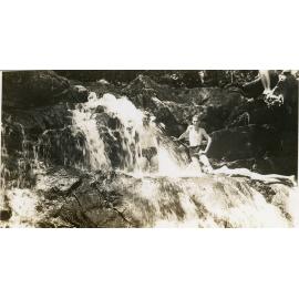 Three men near a waterfall, Mount Spec, 30 January 1939