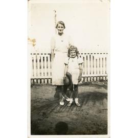 Family photograph from the Quelch Forno collection : Woman and girl posing for an outdoor photograph