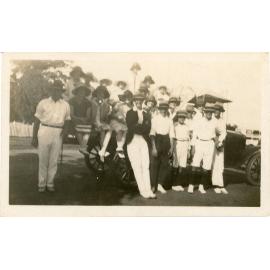 Family photograph from the Quelch Forno collection : Group of men and children posing for a photograph
