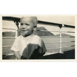 Family photograph from the Quelch Forno collection : child onboard ship