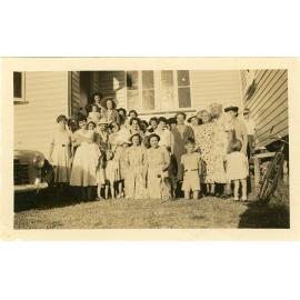 Family photograph from the Quelch Forno collection : Group of women and children posing for a photograph