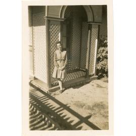 Isabel Atkinson, senior prefect of dorm, taken at front of Aniston House, Blackheath, [1947-1949]