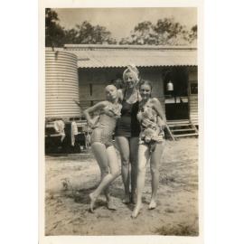 Family photograph from the Quelch Forno collection : A woman and two girls posing in bathing suits