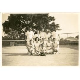 Family photograph from the Quelch Forno collection : Group of tennis players on a tennis court