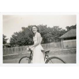Family photograph from the Quelch Forno collection : Beryl Forno astride a bicycle