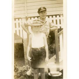 Bruce Todd in military uniform standing with Ron Quelch, Townsville