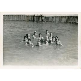 Family photograph from the Quelch Forno collection : A group of swimmers in sea baths