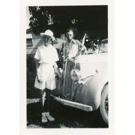 Family photograph from the Quelch Forno collection: Ray and Dad beside our car on the day of the Queen's visit