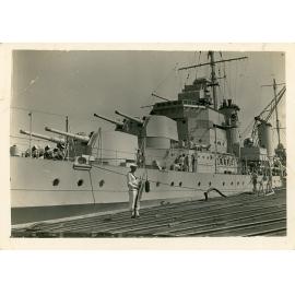 Naval ship and sailors in harbour