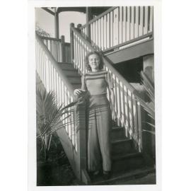 Family photograph from the Quelch Forno collection : Beryl Forno posing for photograph on front stairs of a house