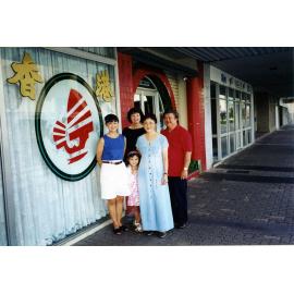Chun Tie family in front of the Hong Kong Restaurant, Flinders Street, Townsville, 1998