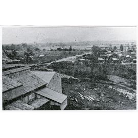View of Giru and the Haughton River from the sugar mill during floods, circa 1940