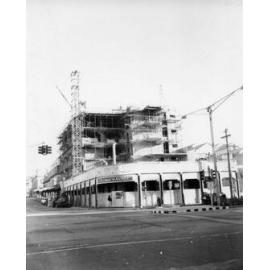 Demolition of Lowths Hotel, with stage one of new hotel building, corner of Flinders and Stanley Streets, Townsville City, Townsville, 23 August 1967