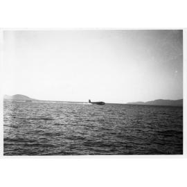 QANTAS flying boat VH-ABF taking off. Townsville, ca. 1939