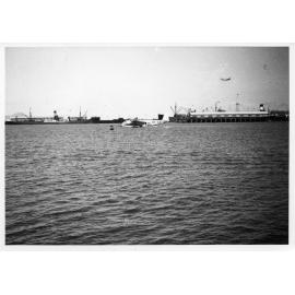 QANTAS flying boat VH-ABF moored in Townsville harbour, ca. 1939