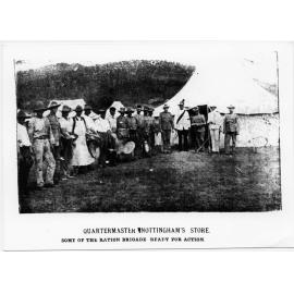Quatermaster Nottingham's (black sash) store with members of the ration brigade ready for action. Townsville encampment, 24 June 1901