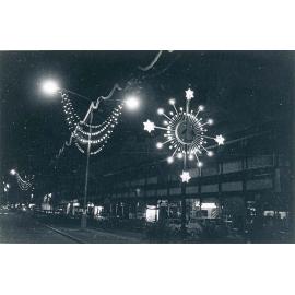 Illuminated street decorations,, Flinders Street, Townsville, December 1977