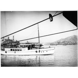 View of the Townsville harbour, showing the pilot launch and the HMT Katoomba, 25th March 1945