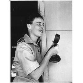 Broadcasting over the camp Tannoy system at the 66 AWAS Barracks, Townsville, 30th May 1945