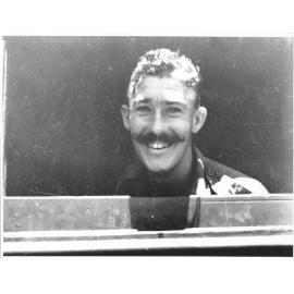 A member of the 24th Aust. Inf. Bde. seeing Townsville on arrival on 28/1/44 after fighting for many months in the Finschhafen area of New Guinea