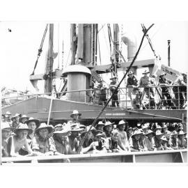 Members of the 24th Inf. Bde. waiting to disembark at Townsville on 28/1/44 after fighting for several months in the Finschhafen area of New Guinea