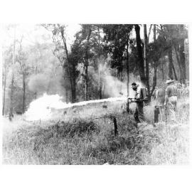 Portable flame thrower being demonstrated in Townsville, 1943