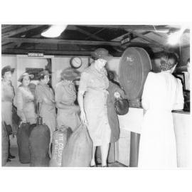 Members of the Australian Women's Army Service at Garbutt airport, Townsville on their way to Darwin, 2nd April, 1945