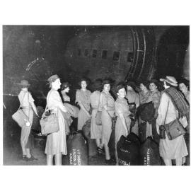 Members of the Australian Women's Army Service at Garbutt airport, Townsville, ready to board a plane to Darwin, 2nd April, 1945