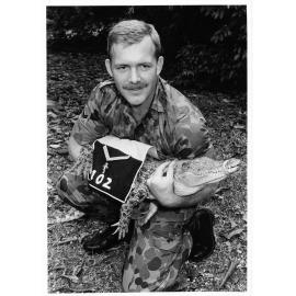 Cpl Kev Swatten, 102 Field workshops, gets CFN Sault Water Crock ready for parade. CFN Sault Water Crock is be promoted to Lance Corporal. Townsville, 1988